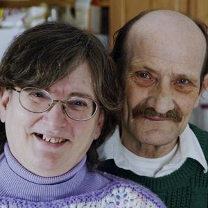 Man and woman, smiling