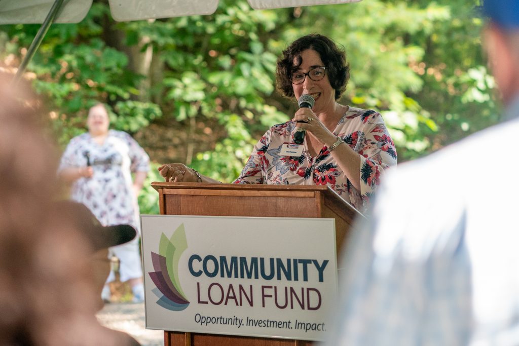 New Hampshire Community Loan Fund's Jennifer Hopkins welcomes the attendees